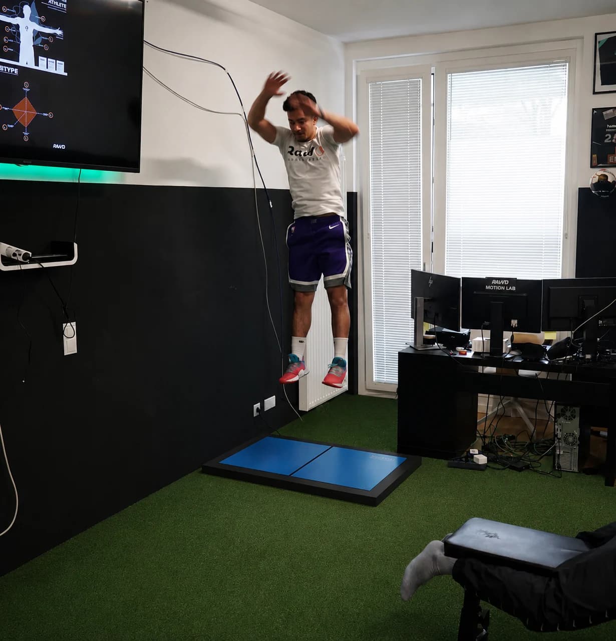 Athlete completing a jump assessment at the VANE Training Lab in Vienna